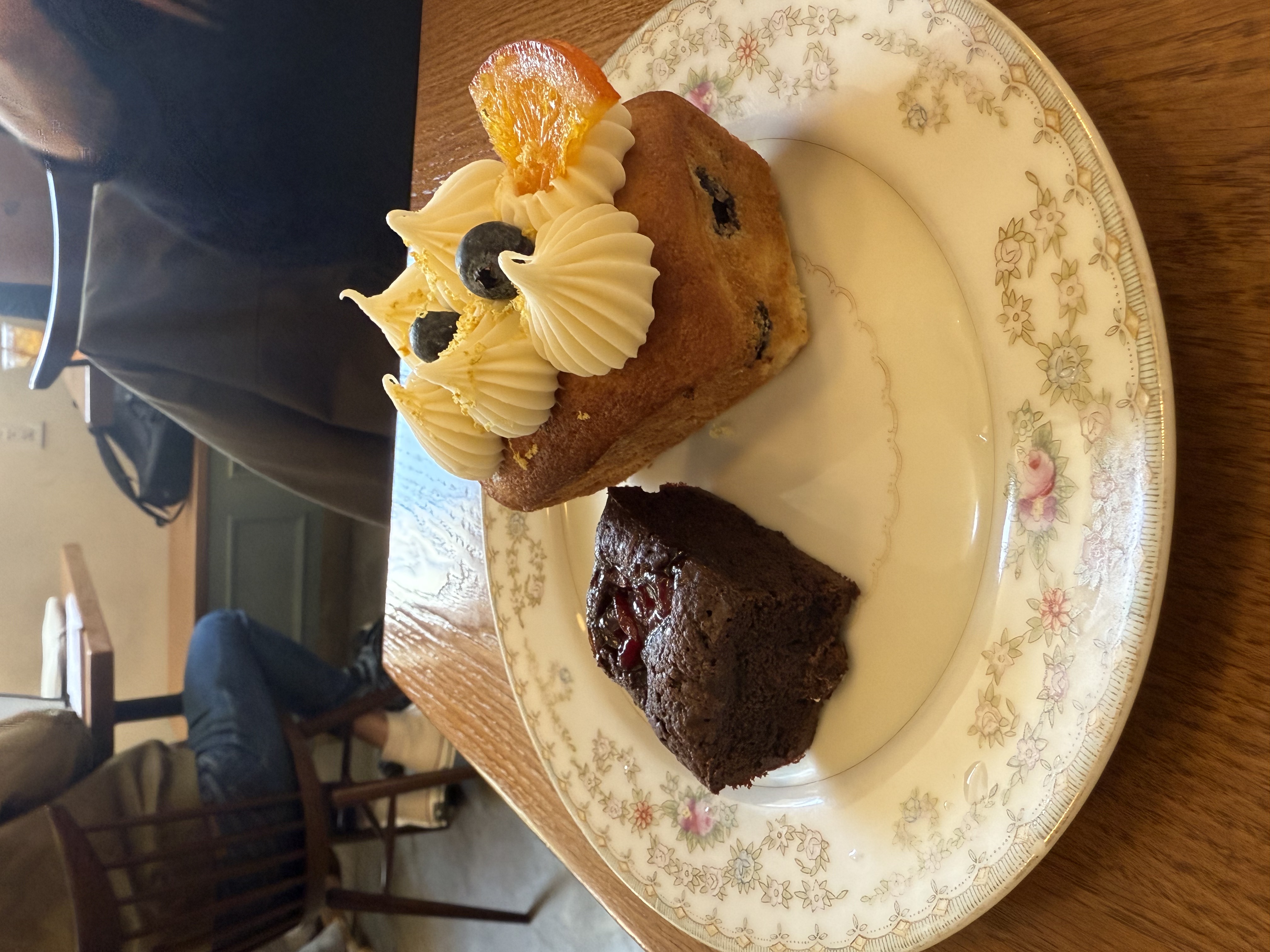Cherry brownie and blueberry lemon cake on a plate